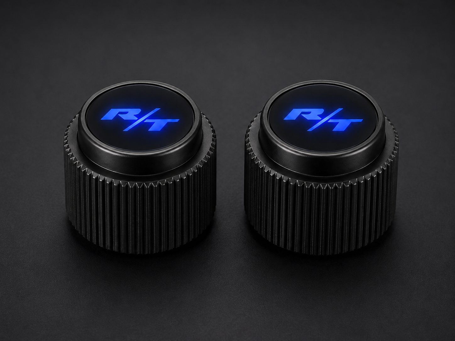 Pair of custom Dodge Charger radio knobs with glowing blue R/T lenses