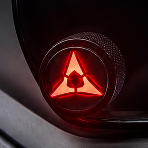 Close-up of the red illuminated Fratzog knob