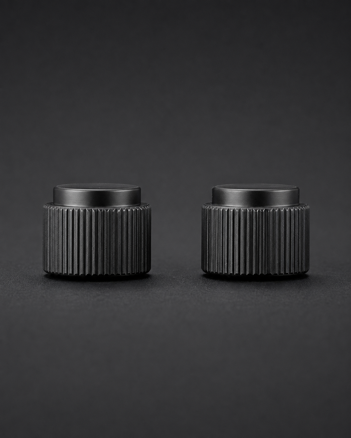 Black ribbed Dodge Charger radio knob bodies