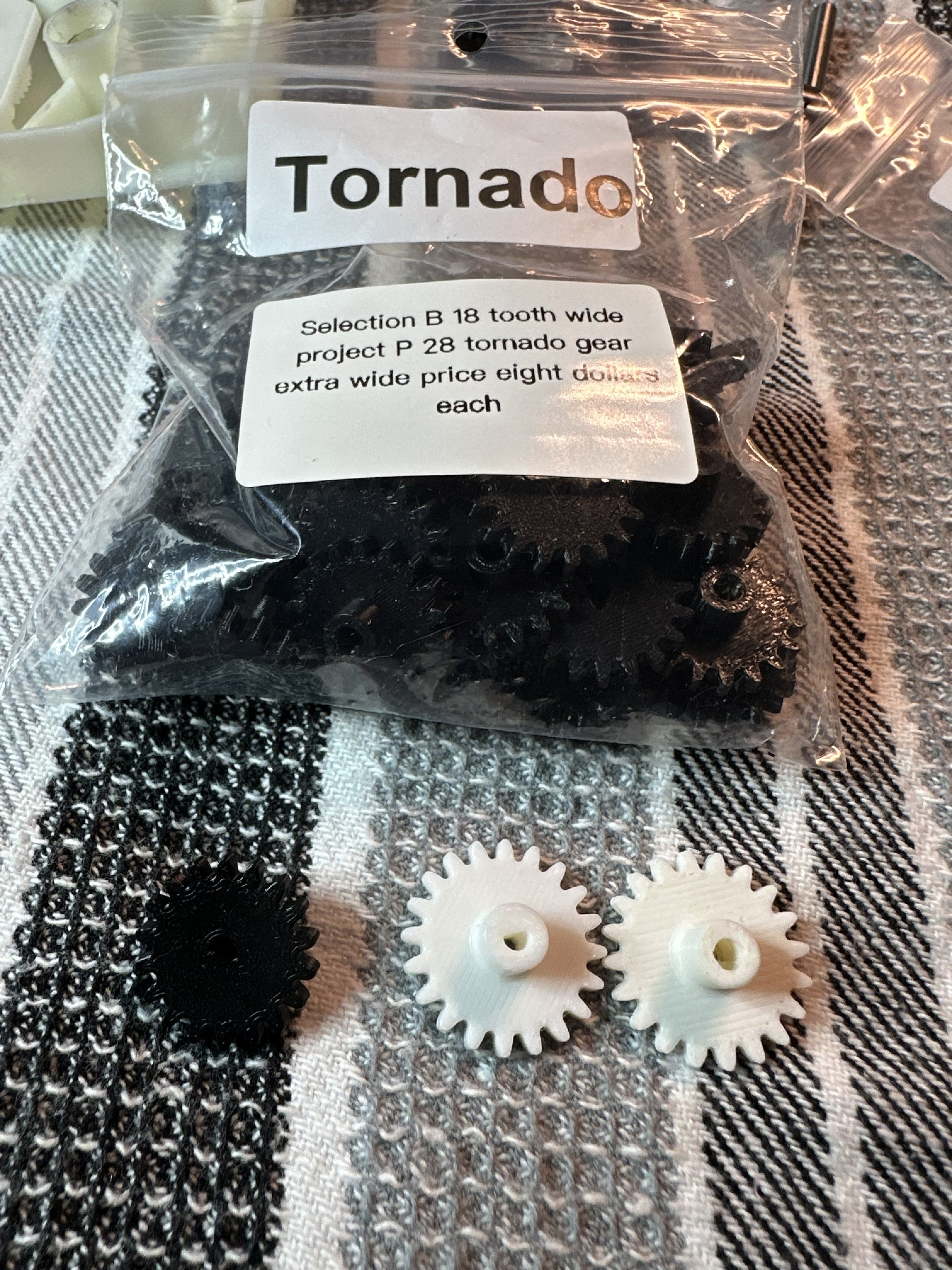 Finished Tornado gears — black and white versions